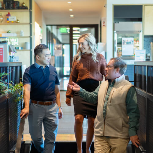 enSYNC team collaborating at a table