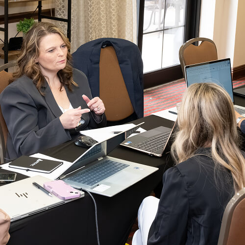 enSYNC team collaborating in a meeting