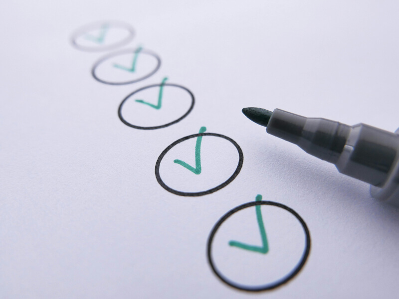 Checklist signifying compliance tasks achieved. 