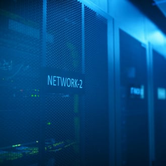 Cybersecurity professional reviewing network activity