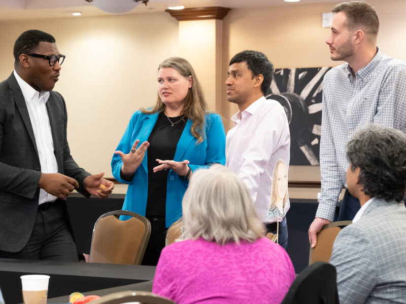 enSYNC team members collaborating in the office