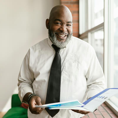 IT leader working on a laptop