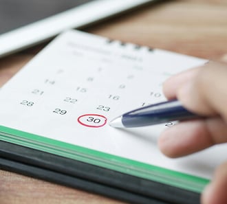 Finance professional reviewing recurring fee deductions