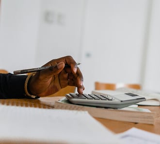 Professional reviewing payment savings and costs
