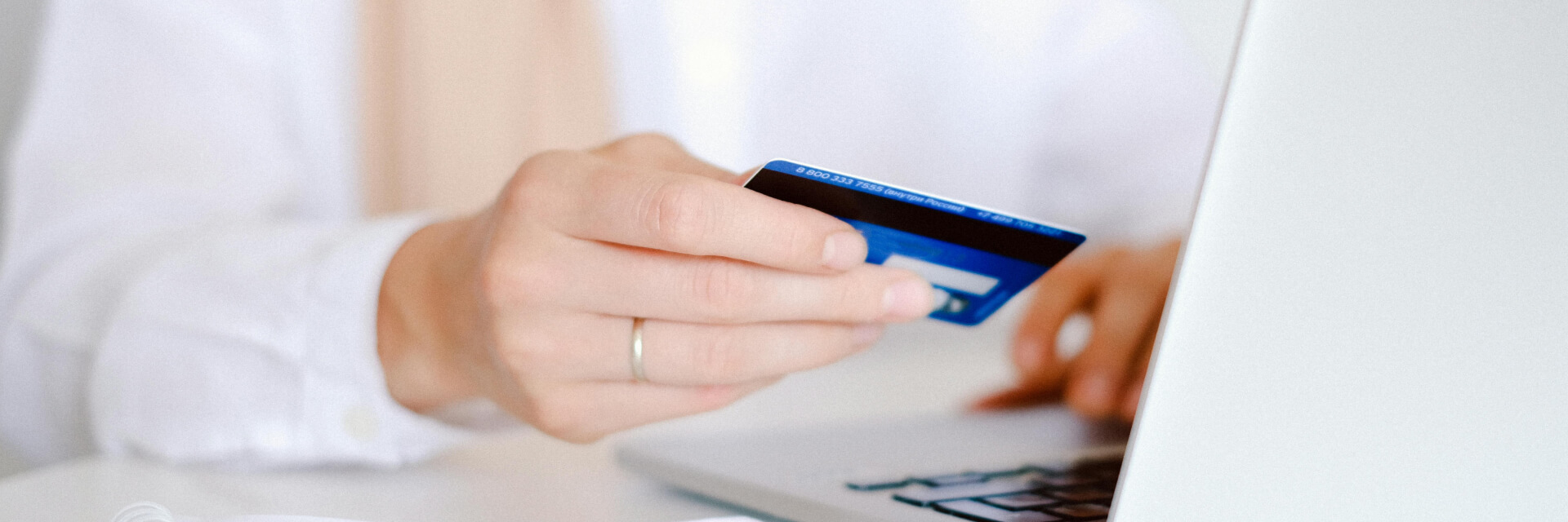 Person using a mobile device for digital payment processing