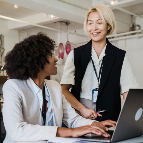 IT and operations leader working on a laptop