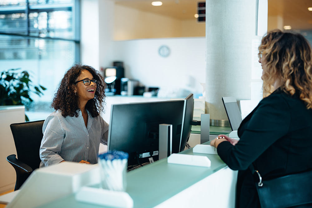 women helping a customer