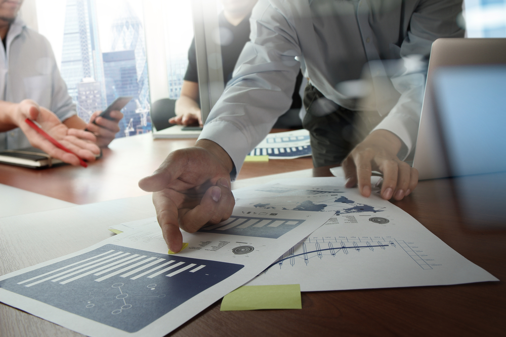 Double exposure of businessman hand working with new modern computer and business strategy as concept-1