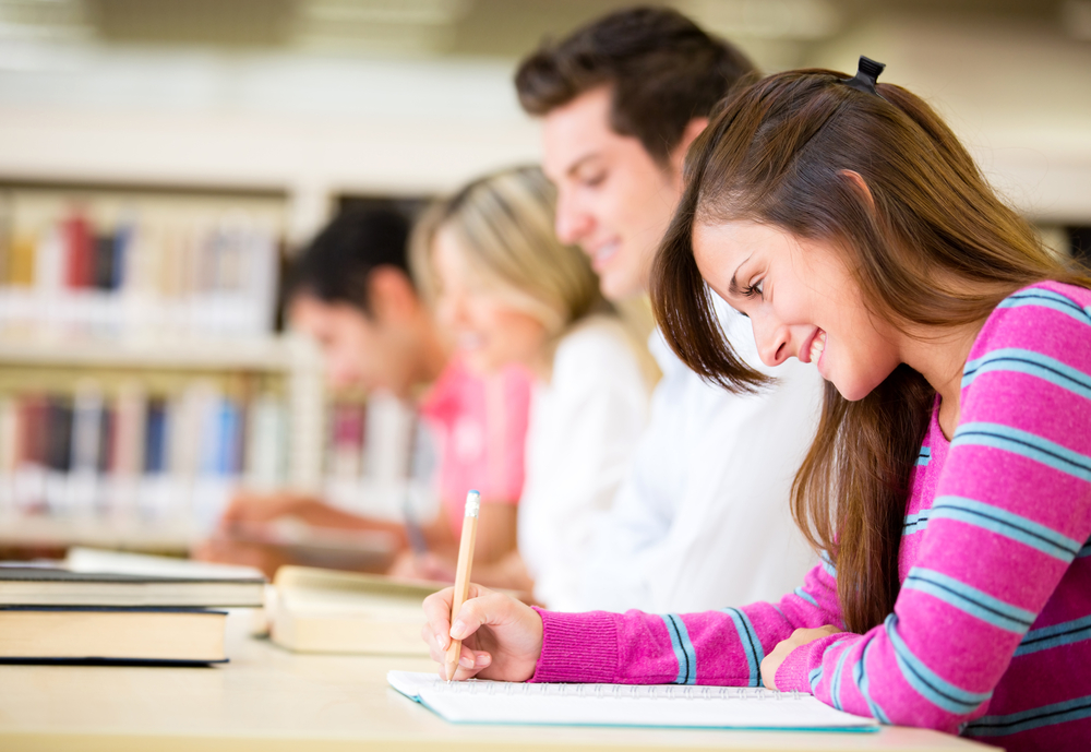 Group of students taking a test at the university