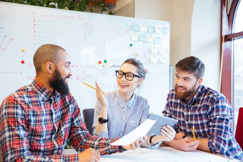 Group planning together in a modern office