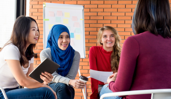 group of women having a meeting